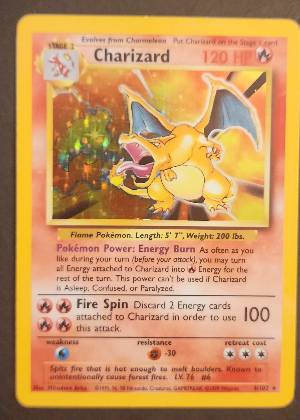 Charizard graded 6 & below