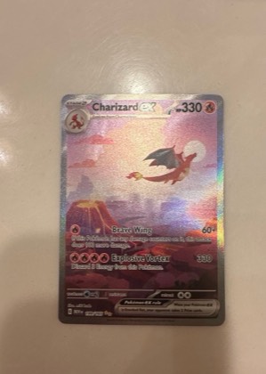 Charizard ex, graded 9.0