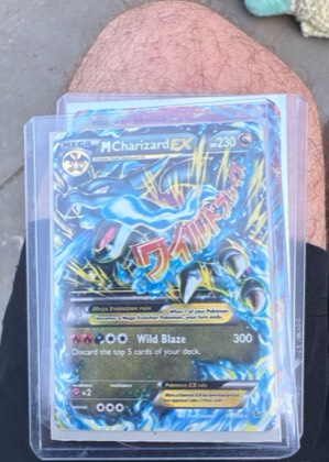 M Charizard EX (X), graded 9.0