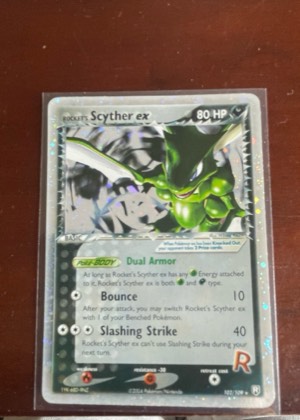 Rocket's Scyther ex, graded 8.5