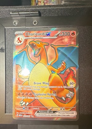 Charizard ex, graded 9.0