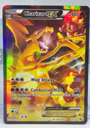 Charizard EX - XY121, graded 8.5