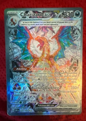 Charizard ex, graded 9.0