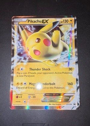 Pikachu EX - XY174, graded 2.5