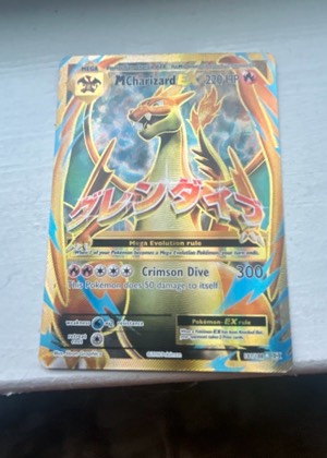 M Charizard EX (Full Art), graded 7.5