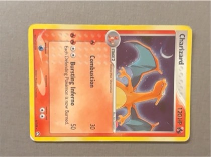 Charizard graded 6 & below