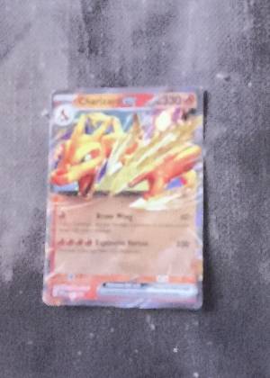 Charizard ex, graded 7.5