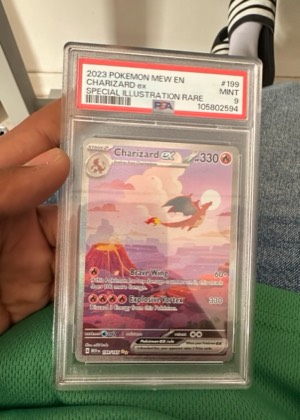 Charizard ex, graded 9.0