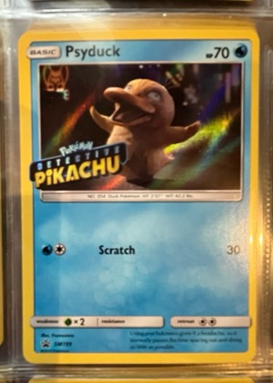 Psyduck - SM199 (Detective Pikachu Stamped), graded 9.5