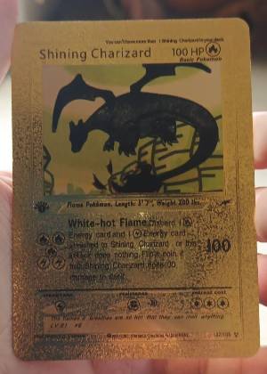 Shining Charizard graded 8