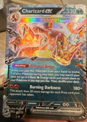 Charizard ex, graded 9.0