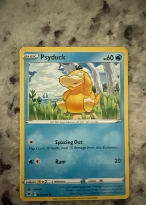 Psyduck, graded 9.5