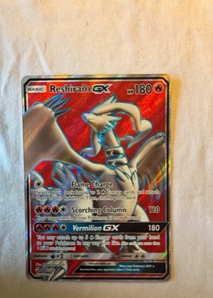 Reshiram GX (Full Art), graded 7.5