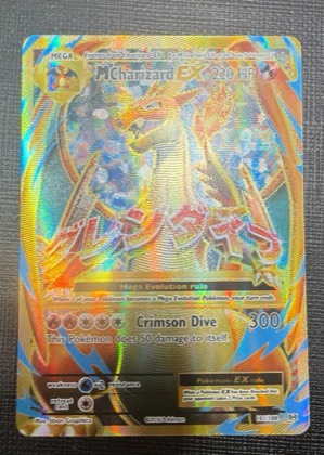 M Charizard EX, graded 9.0