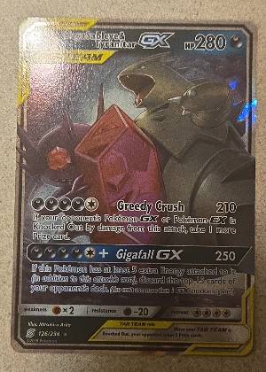 Mega Sableye & Tyranitar GX, graded 7.0