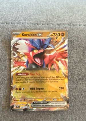 Koraidon ex, graded 9.0