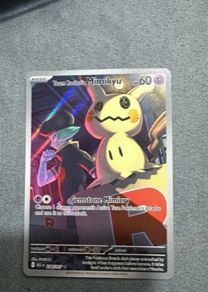 Team Rocket's Mimikyu, graded 9.0