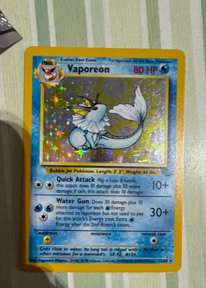 Vaporeon (12), graded 7.5