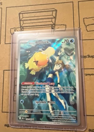 Misty's Psyduck, graded 2.5