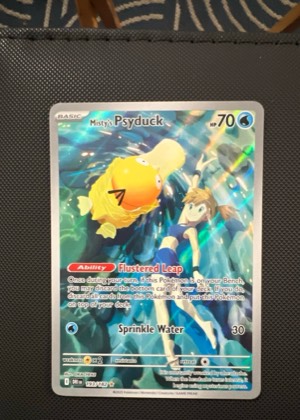 Misty's Psyduck, graded 2.5