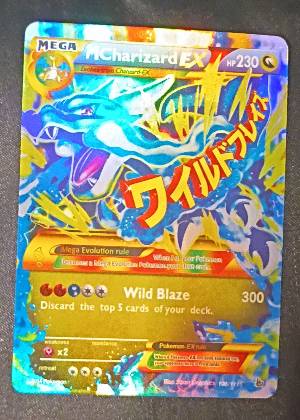 Mega Charizard EX, graded 8.5