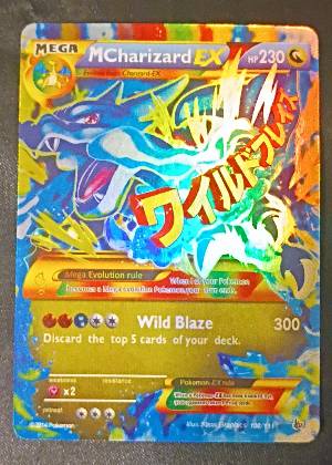 Mega Charizard EX, graded 8.5