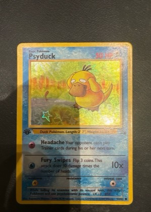 Psyduck graded 7