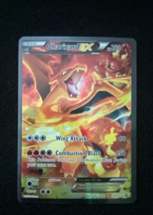 Charizard EX - XY121 graded 8