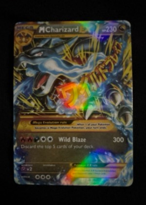 M Charizard EX (Y) graded 8