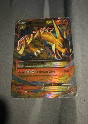 Mega Charizard X ex, graded 7.5