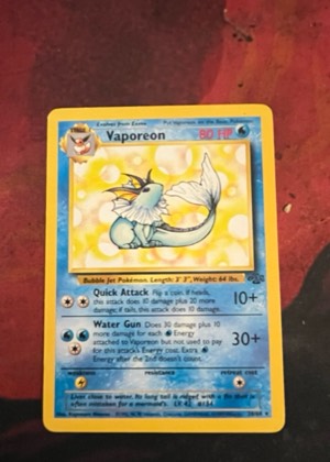 Vaporeon (12), graded 8.0