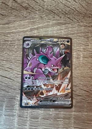 Team Rocket's Nidoking ex, graded 9.0