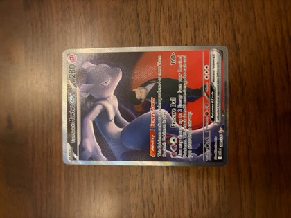 Team Rocket's Mewtwo ex graded 9.5