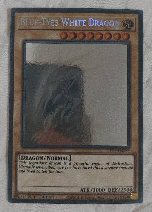 Blue-Eyes White Dragon (Ghost Rare), graded 8.5