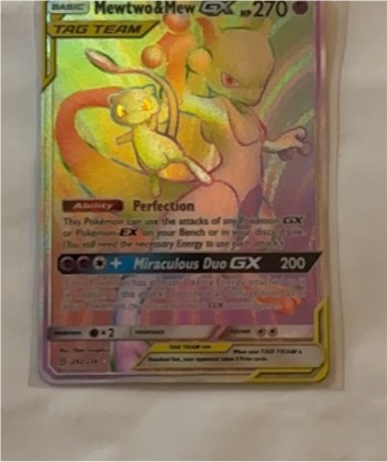 Mewtwo & Mew GX (Secret) graded 6 & below