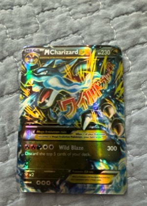 M Charizard EX (Y) graded 6 & below
