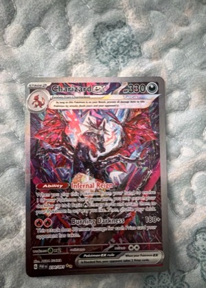Charizard ex, graded 9.0