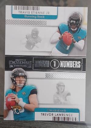 Trevor Lawrence / Travis Etienne Jr., graded 9.0