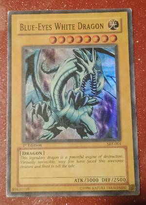 Blue-Eyes White Dragon graded 6 & below