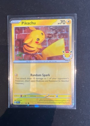 Pikachu - 051/162 (Cosmo Holo), graded 8.5