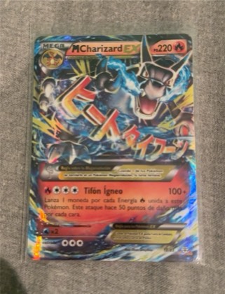 M Charizard EX, graded 9.0