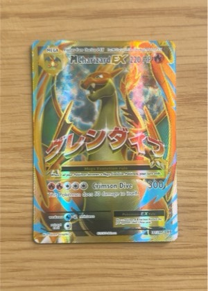 M Charizard EX (Full Art), graded 9.0