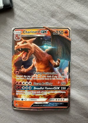 Charizard GX - SM195, graded 4.0