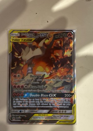 Reshiram & Charizard GX - SM201 graded 8.5