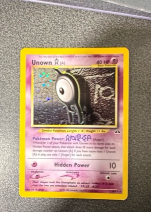 Unown [A] (14), graded 8.0