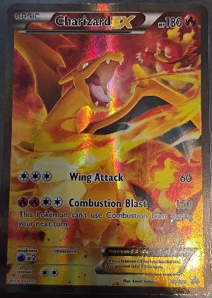 Charizard EX, graded 6.5