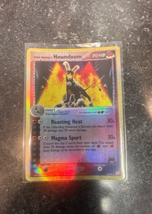 Team Magma's Houndoom, graded 8.5