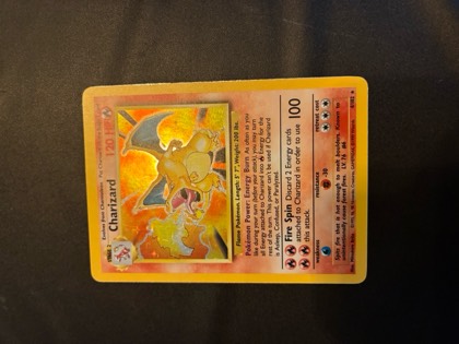 Charizard graded 7