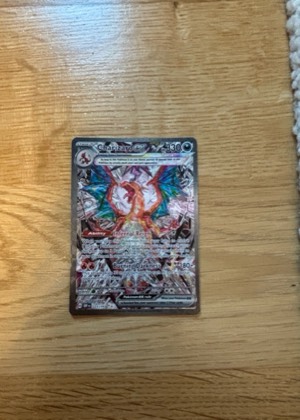 Charizard ex, graded 9.0