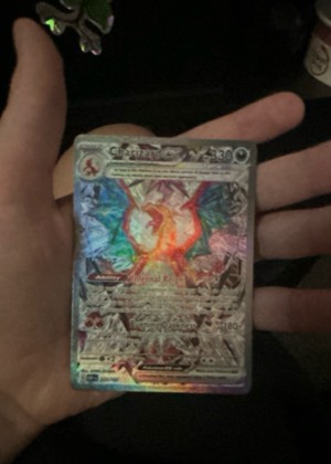 Charizard ex, graded 7.5